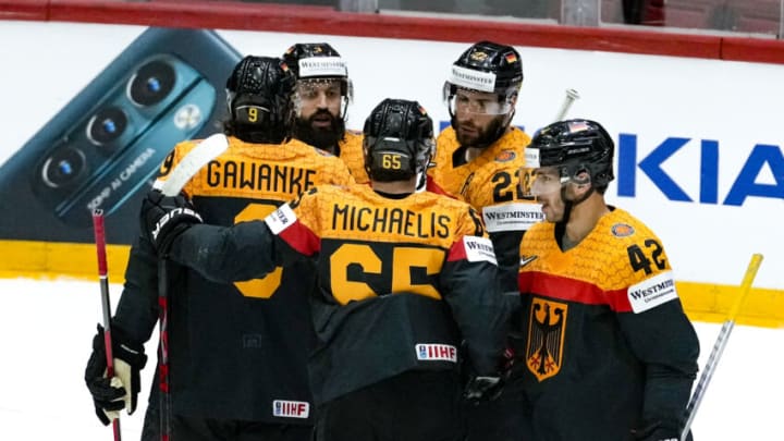 HELSINKI, FINLAND - MAY 20: Germany squad celebrates during the 2022 IIHF Ice Hockey World Championship match between Germany and Italy at Helsinki Ice Hall on May 20, 2022 in Helsinki, Finland. (Photo by Jari Pestelacci/Eurasia Sport Images/Getty Images)
