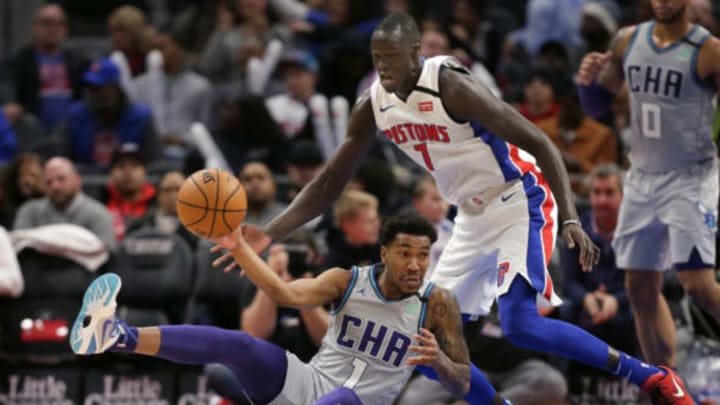 DETROIT, MI – FEBRUARY 10: Malik Monk #1 of the Charlotte Hornets passes the ball while being guarded by Thon Maker #7 of the Detroit Pistons. (Photo by Duane Burleson/Getty Images)