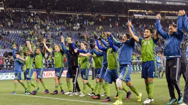 Oct 30, 2016; Seattle, WA, USA; The Seattle Sounders FC celebrate with the fans after defeating FC Dallas at CenturyLink Field. Seattle Sounders FC defeated FC Dallas 3-0. Mandatory Credit: Steven Bisig-USA TODAY Sports