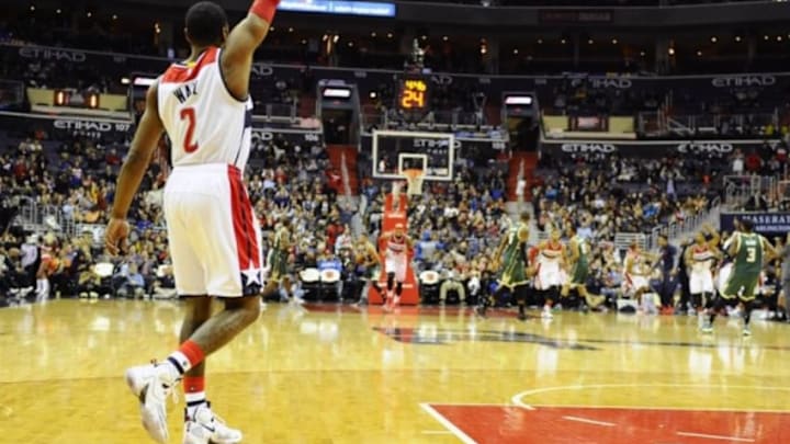Jan 13, 2016; Washington, DC, USA; Washington Wizards guard John Wall (2) celebrates after a score against the Milwaukee Bucks during the first half at Verizon Center. Mandatory Credit: Brad Mills-USA TODAY Sports