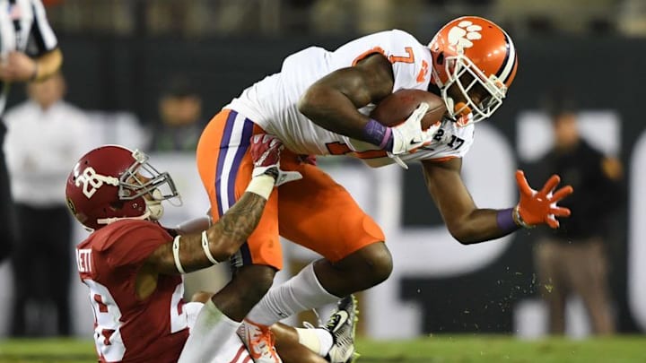 Jan 9, 2017; Tampa, FL, USA; Clemson Tigers wide receiver Mike Williams (7) runs the ball as Alabama Crimson Tide defensive back Anthony Averett (28) defends during the first quarter in the 2017 College Football Playoff National Championship Game at Raymond James Stadium. Mandatory Credit: John David Mercer-USA TODAY Sports