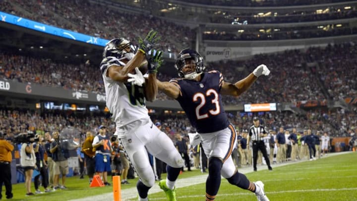 CHICAGO, IL - SEPTEMBER 17: Tyler Lockett #16 of the Seattle Seahawks receives a pass against Kyle Fuller #23 of the Chicago Bears for a touchdown in the fourth quarter at Soldier Field on September 17, 2018 in Chicago, Illinois. (Photo by Quinn Harris/Getty Images)