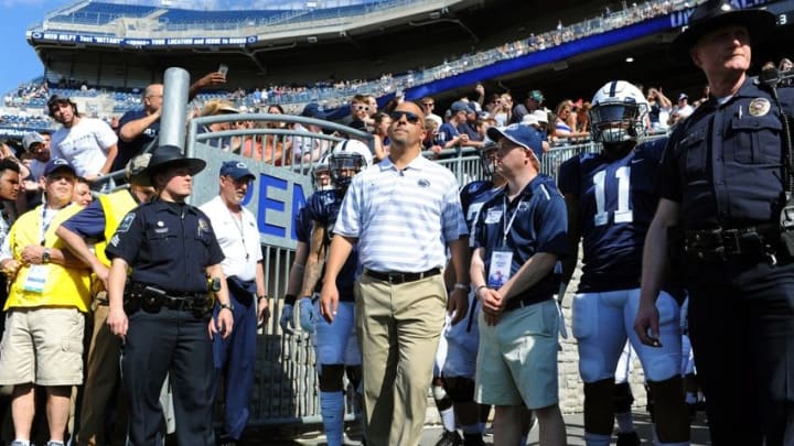 Apr 18, 2015; University Park, PA, USA; Penn State Nittany Lions head coach James Franklin leads his team to the field prior to the start of the Blue White spring game at Beaver Stadium. The Blue team won the game 17-7. Mandatory Credit: Rich Barnes-USA TODAY Sports