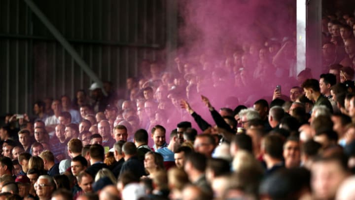 LONDON, ENGLAND - JULY 27: West Ham fans set off a flare during the Pre-Season Friendly match between West Ham United and Fulham at Craven Cottage on July 27, 2019 in London, England. (Photo by Warren Little/Getty Images)