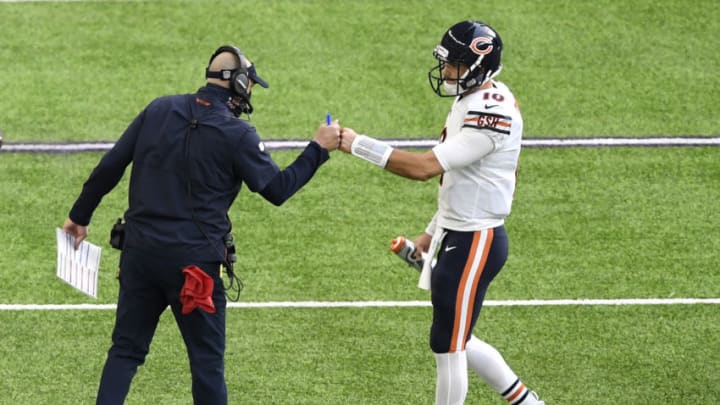 MINNEAPOLIS, MINNESOTA - DECEMBER 20: Head coach Matt Nagy of the Chicago Bears fist bumps Mitchell Trubisky #10 during the first half against the Minnesota Vikings at U.S. Bank Stadium on December 20, 2020 in Minneapolis, Minnesota. (Photo by Hannah Foslien/Getty Images)