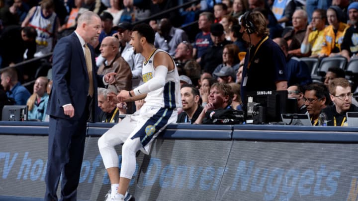 Sacramento Kings v Denver NuggetsDENVER, CO - MARCH 11: Head coach Michael Malone and Jamal Murray #27 of the Denver Nuggets speak during the game against the Sacramento Kings on March 11, 2018 at the Pepsi Center in Denver, Colorado. NOTE TO USER: User expressly acknowledges and agrees that, by downloading and/or using this Photograph, user is consenting to the terms and conditions of the Getty Images License Agreement. Mandatory Copyright Notice: Copyright 2018 NBAE (Photo by Bart Young/NBAE via Getty Images)Getty ID: 930630000