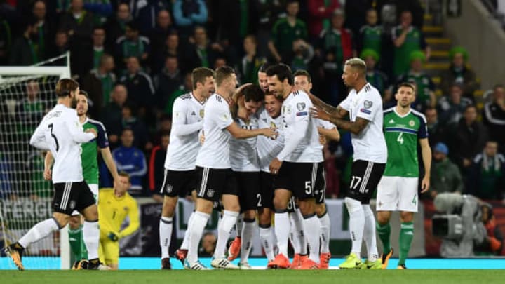 BELFAST, NORTHERN IRELAND – OCTOBER 05: Sebastian Rudy of Germany is mobbed by team mates after scoring during the FIFA 2018 World Cup Qualifier between Northern Ireland and Germany at Windsor Park on October 5, 2017 in Belfast, Northern Ireland. (Photo by Charles McQuillan/Getty Images)