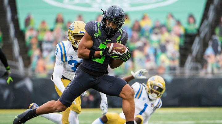 Nov 21, 2020; Eugene, Oregon, USA; Oregon Ducks wide receiver Johnny Johnson III (3) catches a pass during the second half against the UCLA Bruins at Autzen Stadium. The Ducks won 38-35. Mandatory Credit: Troy Wayrynen-USA TODAY Sports