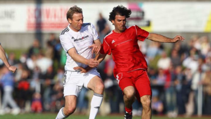 ROSENHEIM, GERMANY – MAY 14: Guido Buchwald (L) battles for the ball with Karl-Heinz Riedle during the First Liga for Charity soccer match event at Jahnstadium on May 14, 2012 in Rosenheim, Germany. (Photo by Alexander Hassenstein/Getty Images)