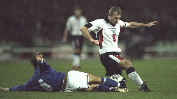 Alessandro Cosacurta of Italy (left) tackles Alan Shearer of England