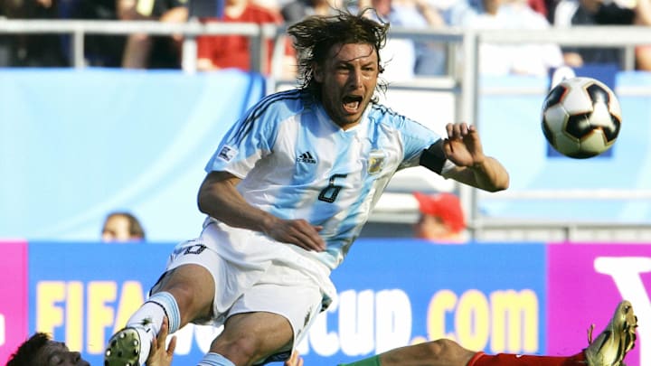 Argentine defender Gabriel Heinze jumps