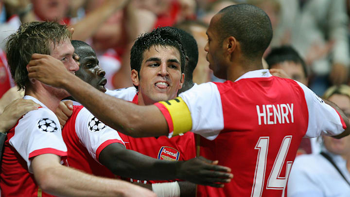 Arsenal captain Thierry Henry (R) celebr