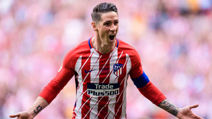 Torres celebra un gol con el equipo colchonero