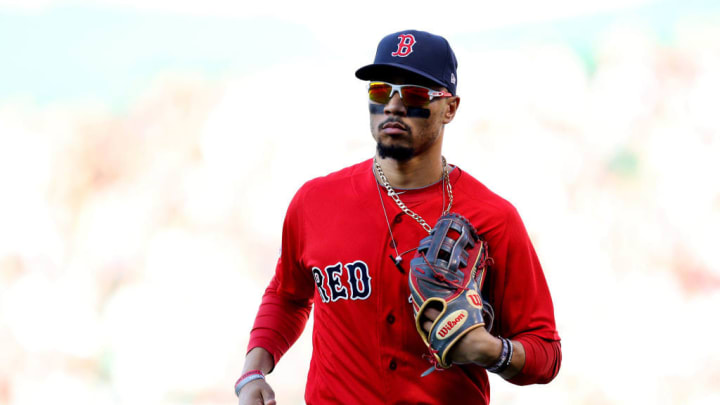 Mookie Betts trots in during a game with the Orioles