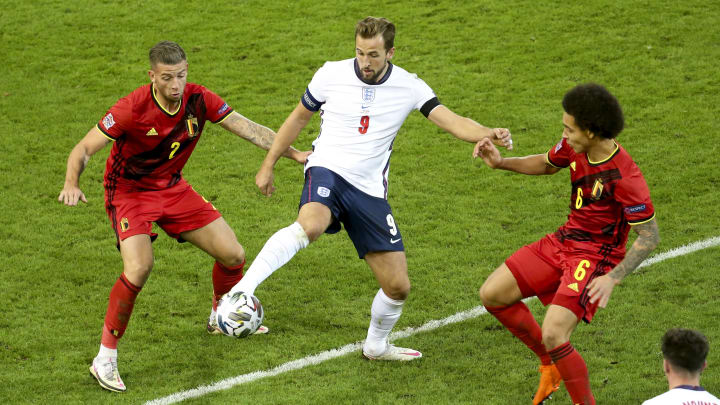 Toby Alderweireld battles Harry Kane during Belgium's clash with England