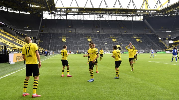Borussia Dortmund celebrate their first goal.