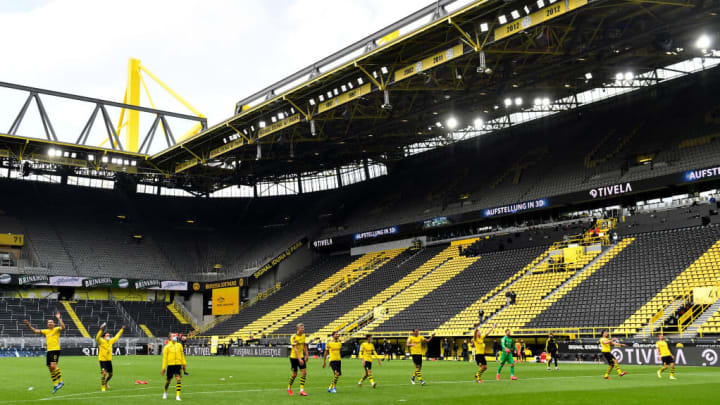 Borussia Dortmund players celebrate the derby win.