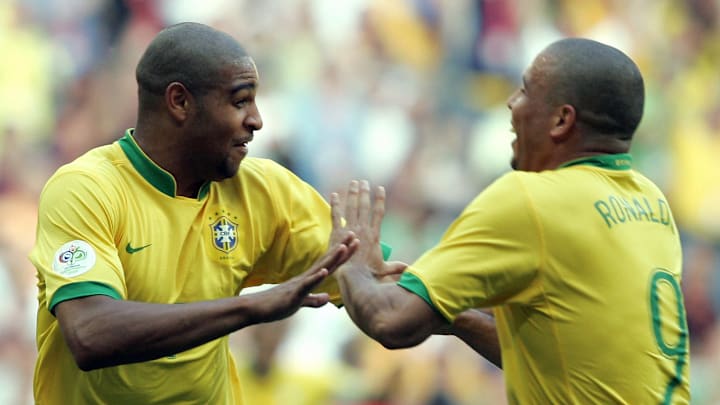 Brazilian forward Adriano (L) celebrates