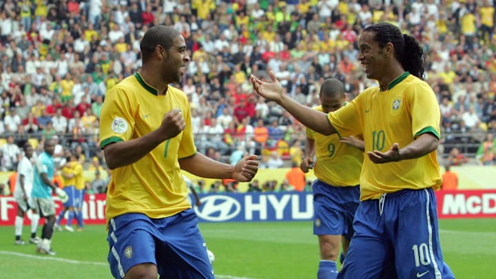 Brazilian forward Adriano (L) celebratin