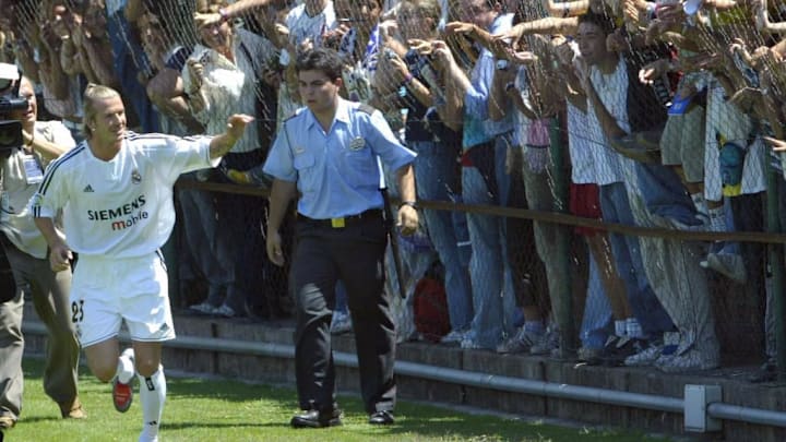 British soccer star, David Beckham waves