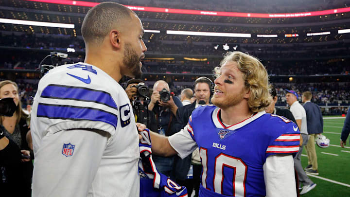 Bills receiver Cole Beasley, right, shares a moment on the field post-game with ex-teammate Dak Prescott.