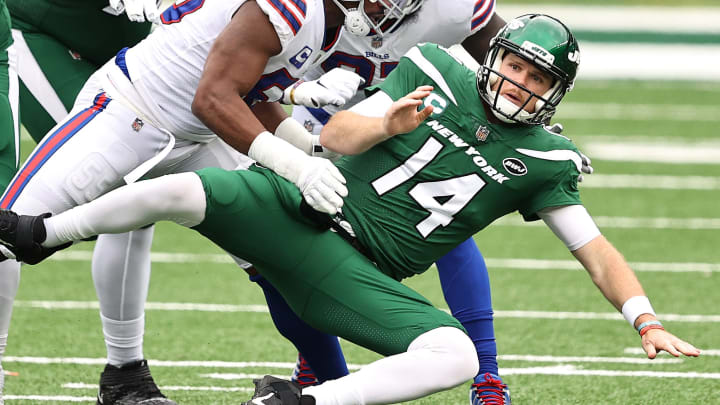 Sam Darnold being tackled during a game against the Buffalo Bills. Sam Darnold being tackled during a game against the Buffalo Bills.