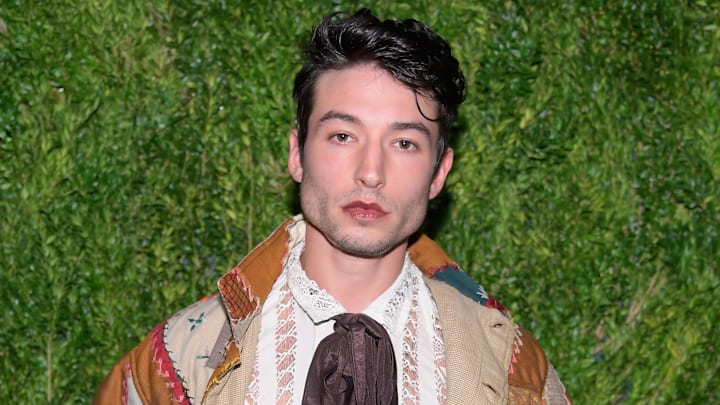 Ezra Miller under fire after video of him choking a fan circulates. Ezra Miller under fire after video of him choking a fan circulates.