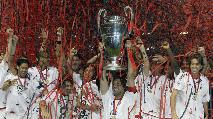 Captain Paolo Maldini of Milan lifts the trophy