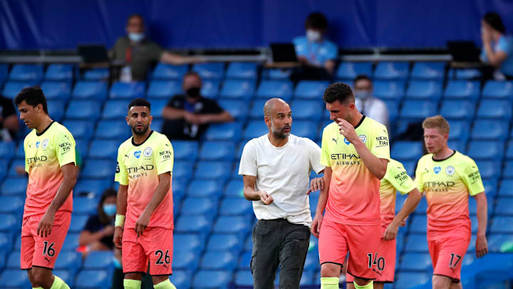 Guardiola dan para pemain Manchester City Guardiola dan para pemain Manchester City