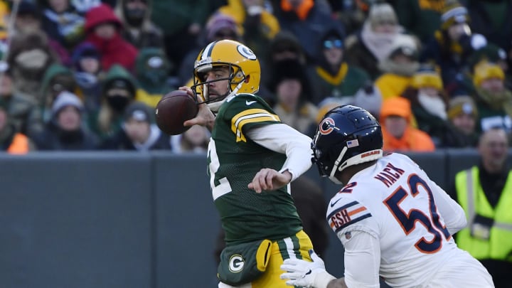 Green Bay Packers QB Aaron Rodgers being chased by Chicago Bears' Khalil Mack