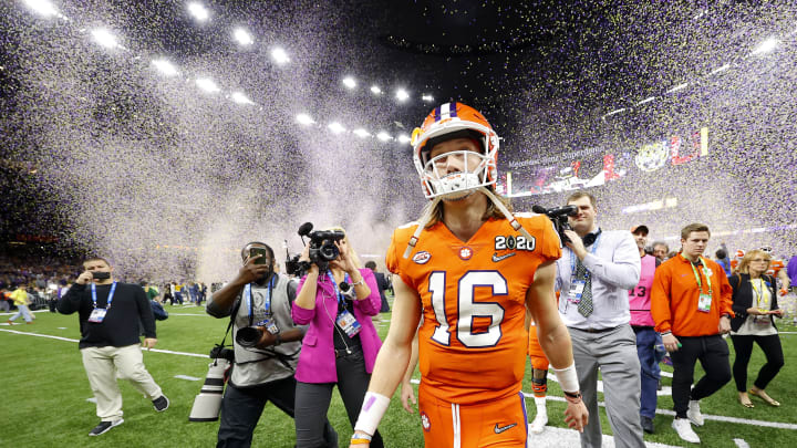 Trevor Lawrence walking off field after losing to LSU