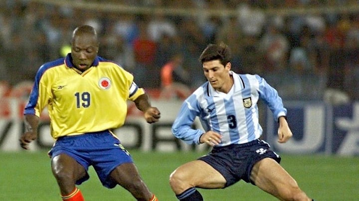 Colombia's Freddy Rincon (19) takes the ball from