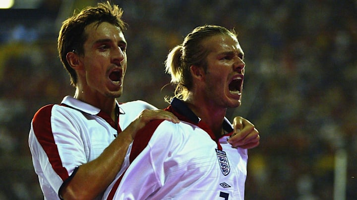 David Beckham of England celebrates his goal with Gary Neville of England