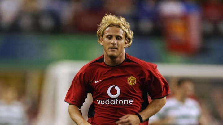 Diego Forlan of Manchester United running with the ball