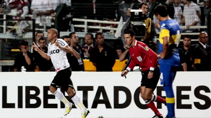 Emerson (L), of Brazil's Corinthians, ce