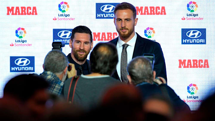 Lionel Messi dan Jan Oblak Lionel Messi dan Jan Oblak