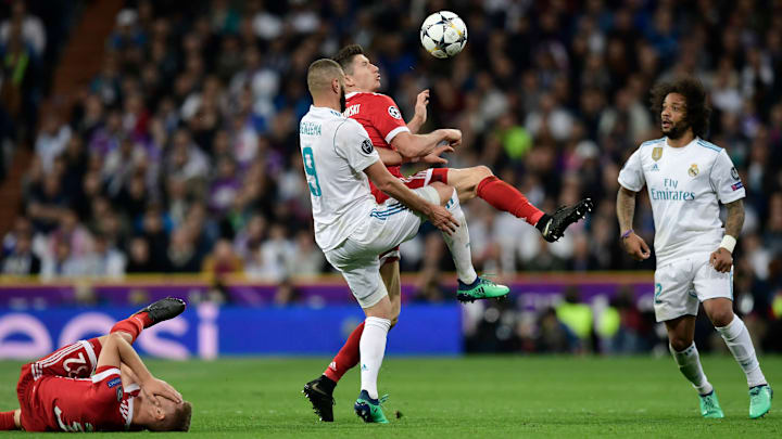 Robert Lewandowski et Karim Benzema lors de la demi-finale de Ligue des Champions en 2018. Robert Lewandowski et Karim Benzema lors de la demi-finale de Ligue des Champions en 2018.