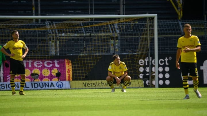 Borussia Dortmund dejected after conceding another goal.
