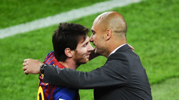 Messi and Guardiola embrace 