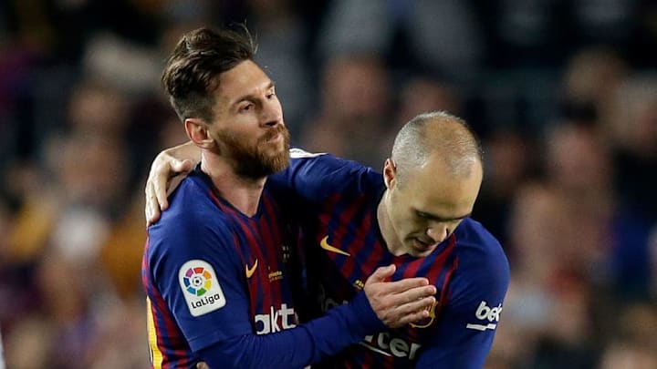 Iniesta y Messi