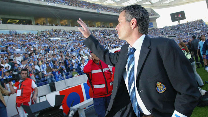 FC Porto's coach Jose Mourinho salutes t