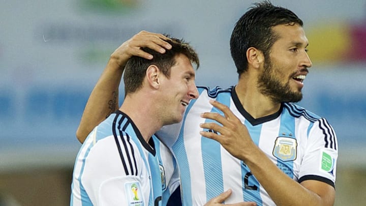 Messi y Garay en el Mundial 2014