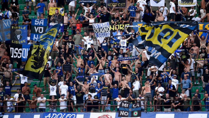 Fans of FC Internazionale show their support during the...