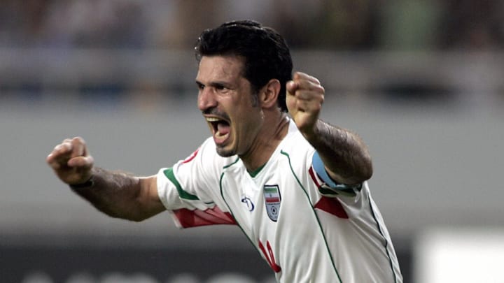 Iran's captain Ali Daei celebrates after