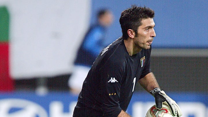 Italian goalkeeper Gianluigi Buffon makes a save a