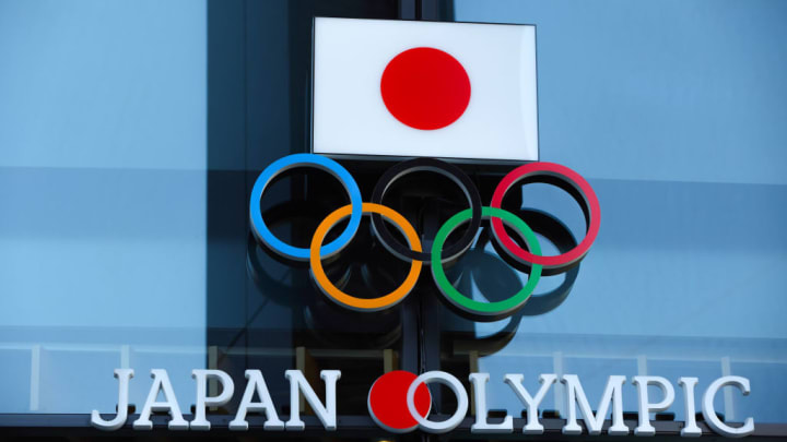 Japanese flag with Olympic Rings above the entrance to Japan...