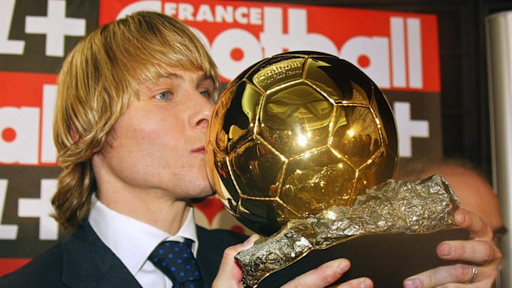Juventus midfielder Pavel Nedved kisses,
