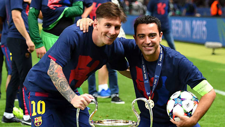 Messi y Xavi
