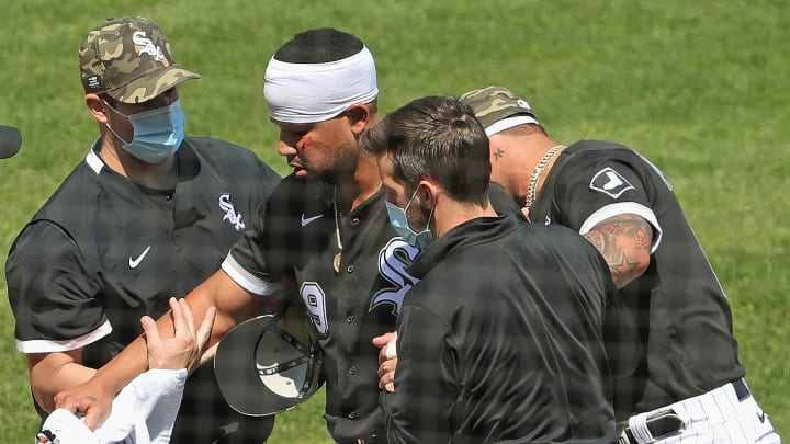 José Abreu y Hunter Dozier quedaron muy golpeados tras la colisión 