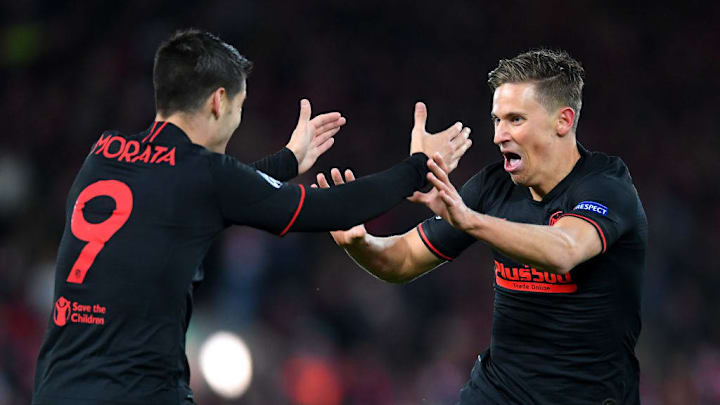 Morata y Llorente celebran la victoria del Atlético de Madrid en Liverpool